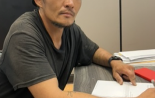 man with backward hat